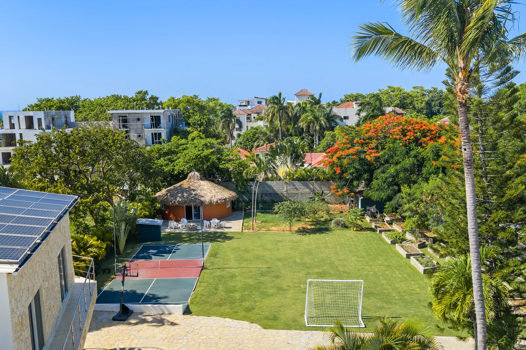 Lawn and sports court at Laguna Oasis